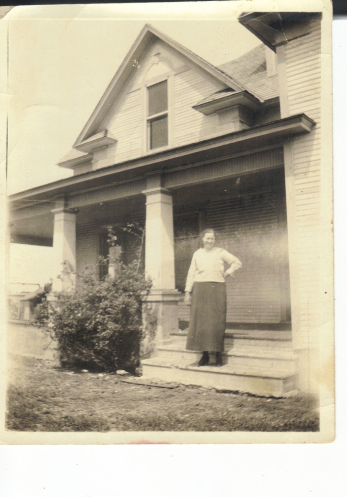 Eula in front of new house circa 1920